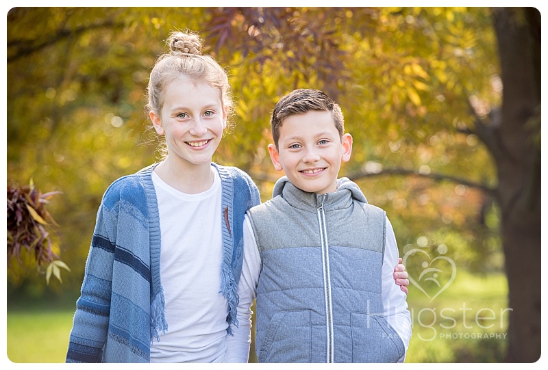 Brother and sister during autumn