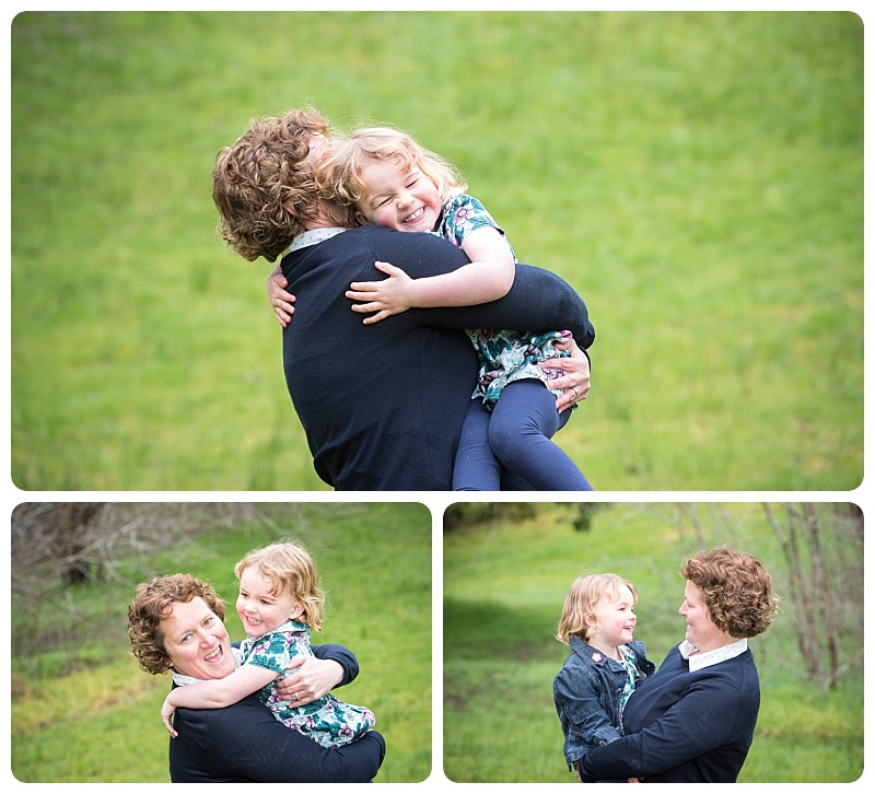 little girl hugging mum