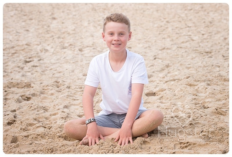 Son at the beach Solo son look at the camera